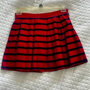 Red and navy pleated skirt